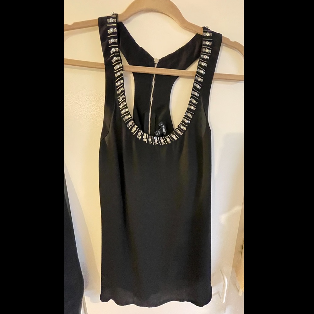 Black Express blouse with jeweled neckline. Size M.